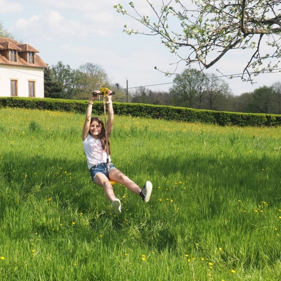 Zip line traverse with child's seat
