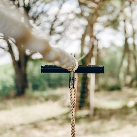 Spring brake for a zip line